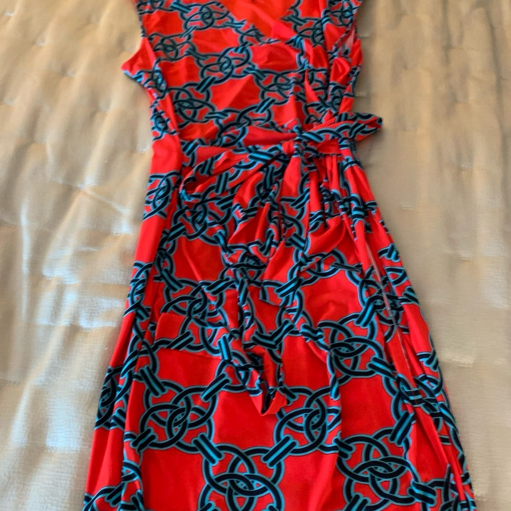 Faux wrap dress size 12   Sleeves, knee length. Laundry by Shelli Segal.